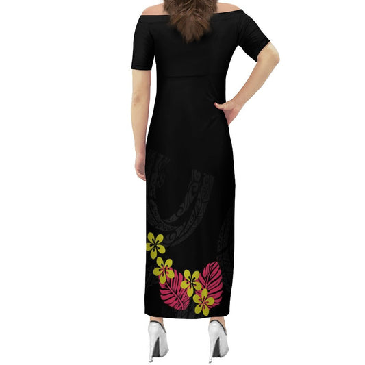 Robe longue bicolore noire/jaune à motif fleurs et feuilles