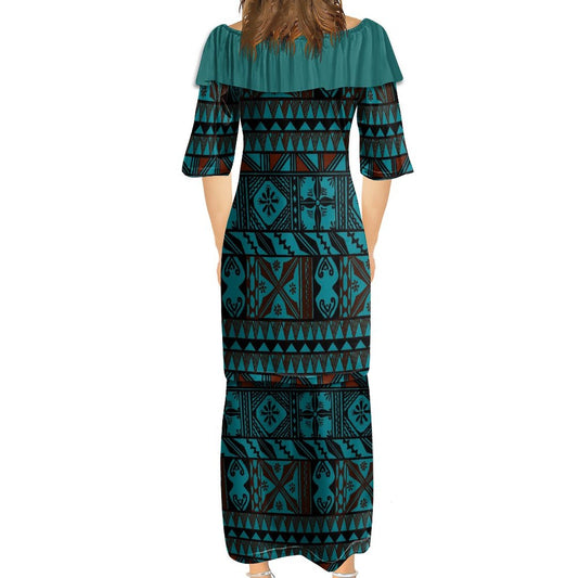 Ensemble kati bleu haut col croisé/jupe motif gatu