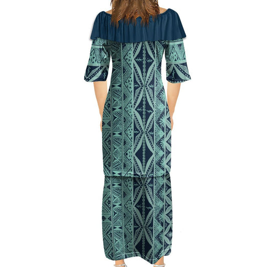 Ensemble kati bleu marrine haut col croisé/jupe motif gatu